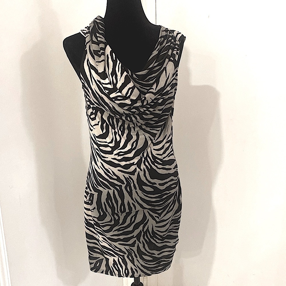Sleeveless Cowl neck fitted  animal print dress. Size Small
